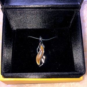 Pendant from Maui Divers. Brand new in box- never been removed. 14K.